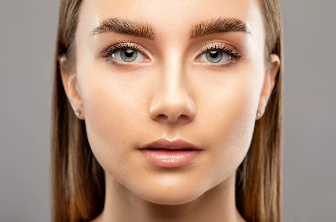 Woman with clear skin after an aesthetic treatment